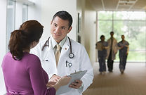 Doctor consulting with patient